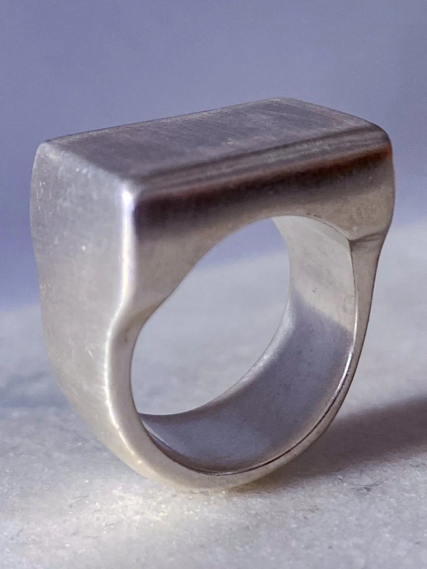 Handcrafted Endless Signet Ring in premium metal, artisan jewelry, geometric design, detailed view