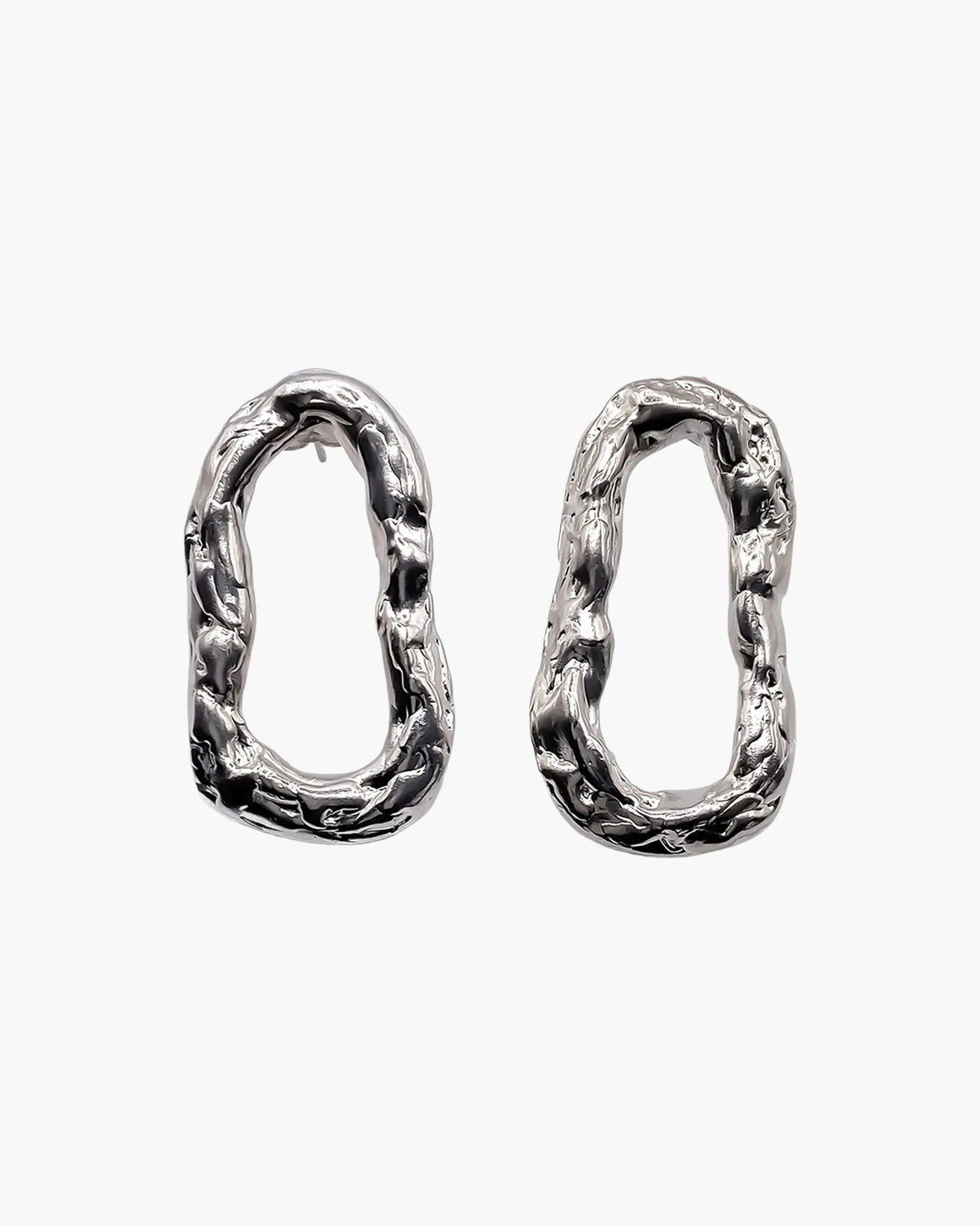 Flow Loop Earrings artisan crafted ring in premium metal, timeless style, lifestyle shot