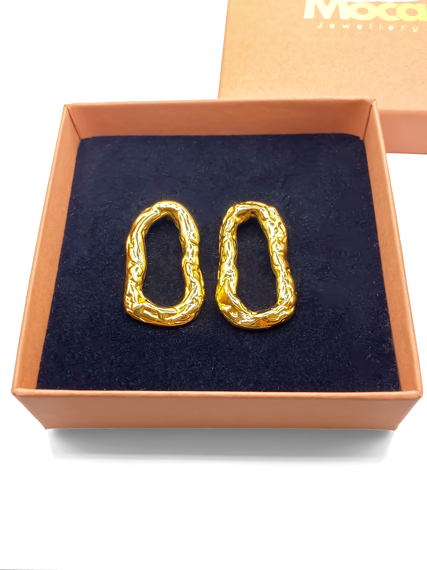 Handmade Flow Loop Earrings in gold with a textured finish, statement design by MOCA Jewellery. Sleek, delicate, minimal style for modern wear.