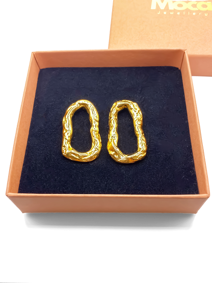 Handmade Flow Loop Earrings in gold with a textured finish, statement design by MOCA Jewellery. Sleek, delicate, minimal style for modern wear.