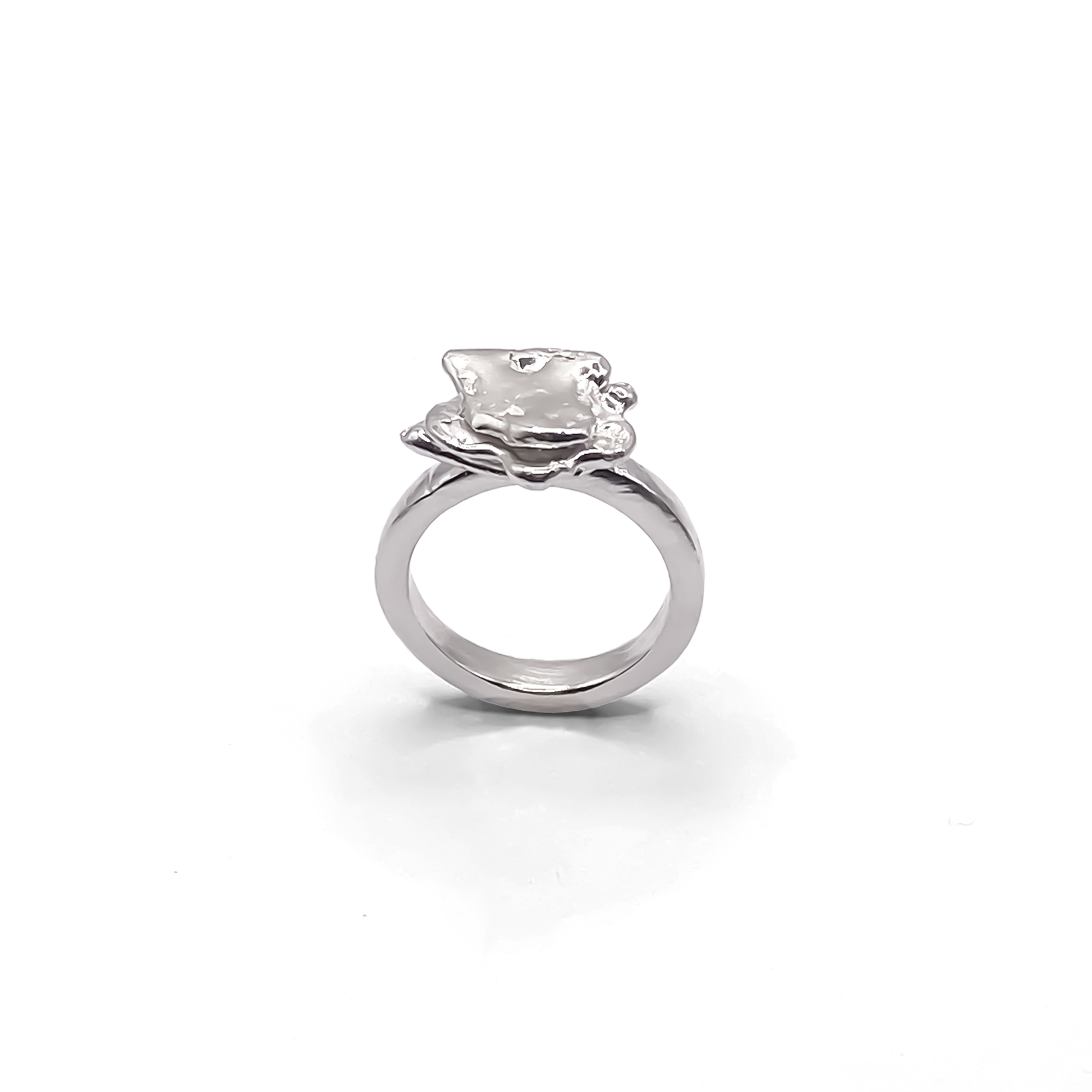 Angled artistic shot of Flower ring - Flower ring statement handmade, abstract gold or silver, Nature-Inspired, free shipping