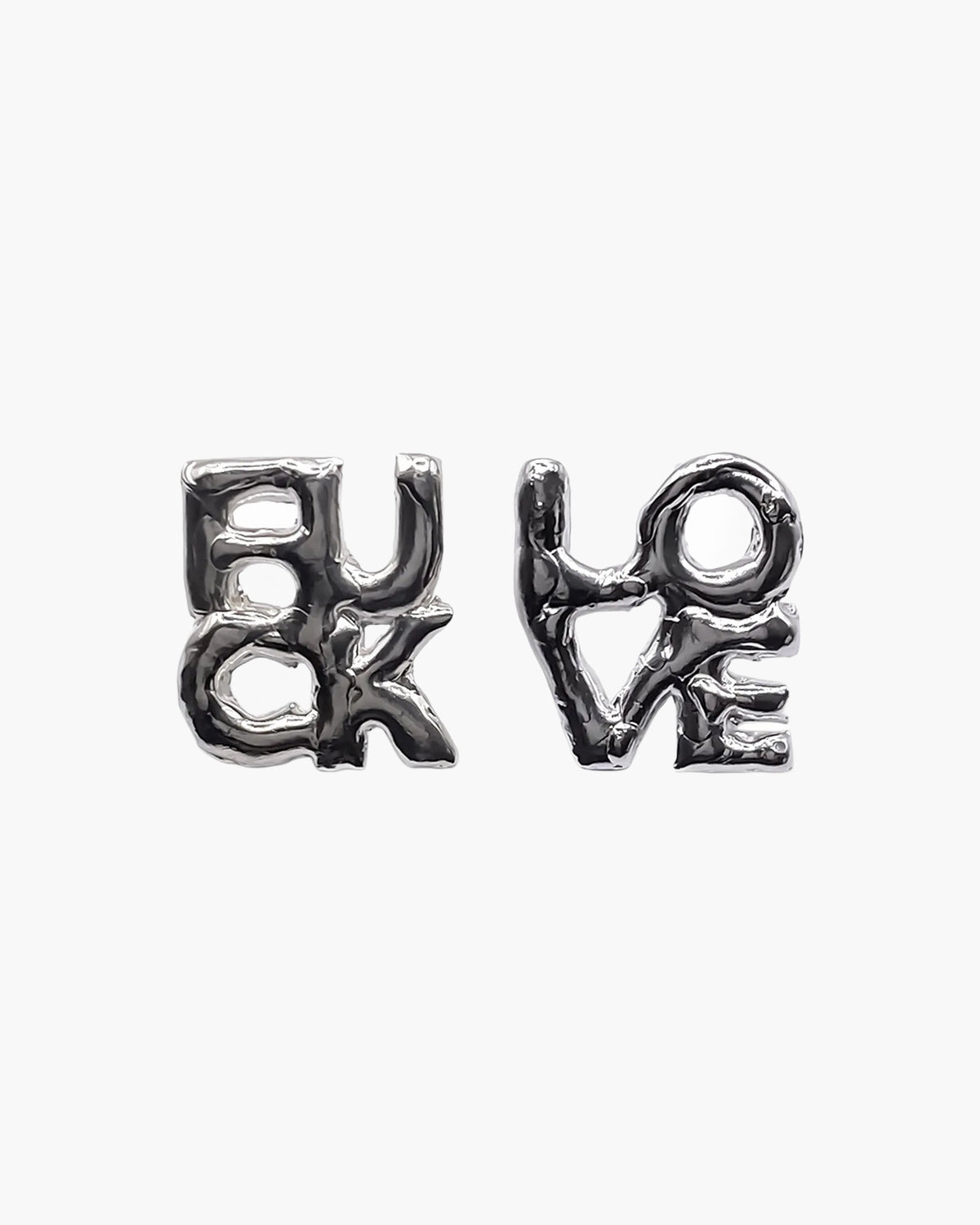 Fuck + Love Earrings in sterling silver, a mismatched FUCK and LOVE pair