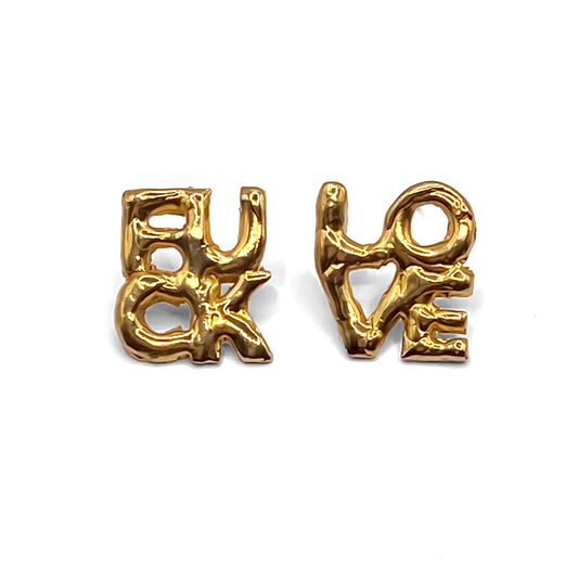 Flatlay of gold FUCK LOVE Earrings – minimal and bold cheeky studs by MOCA Jewellery