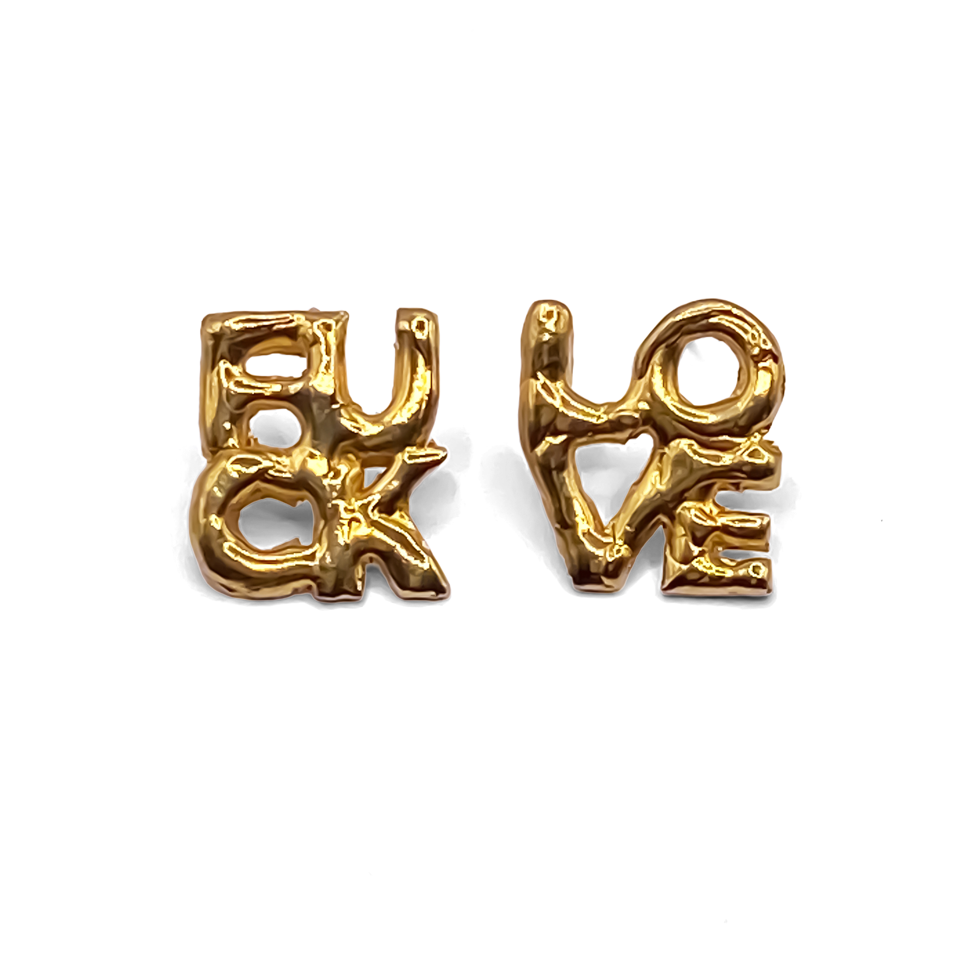 Flatlay of gold FUCK LOVE Earrings – minimal and bold cheeky studs by MOCA Jewellery