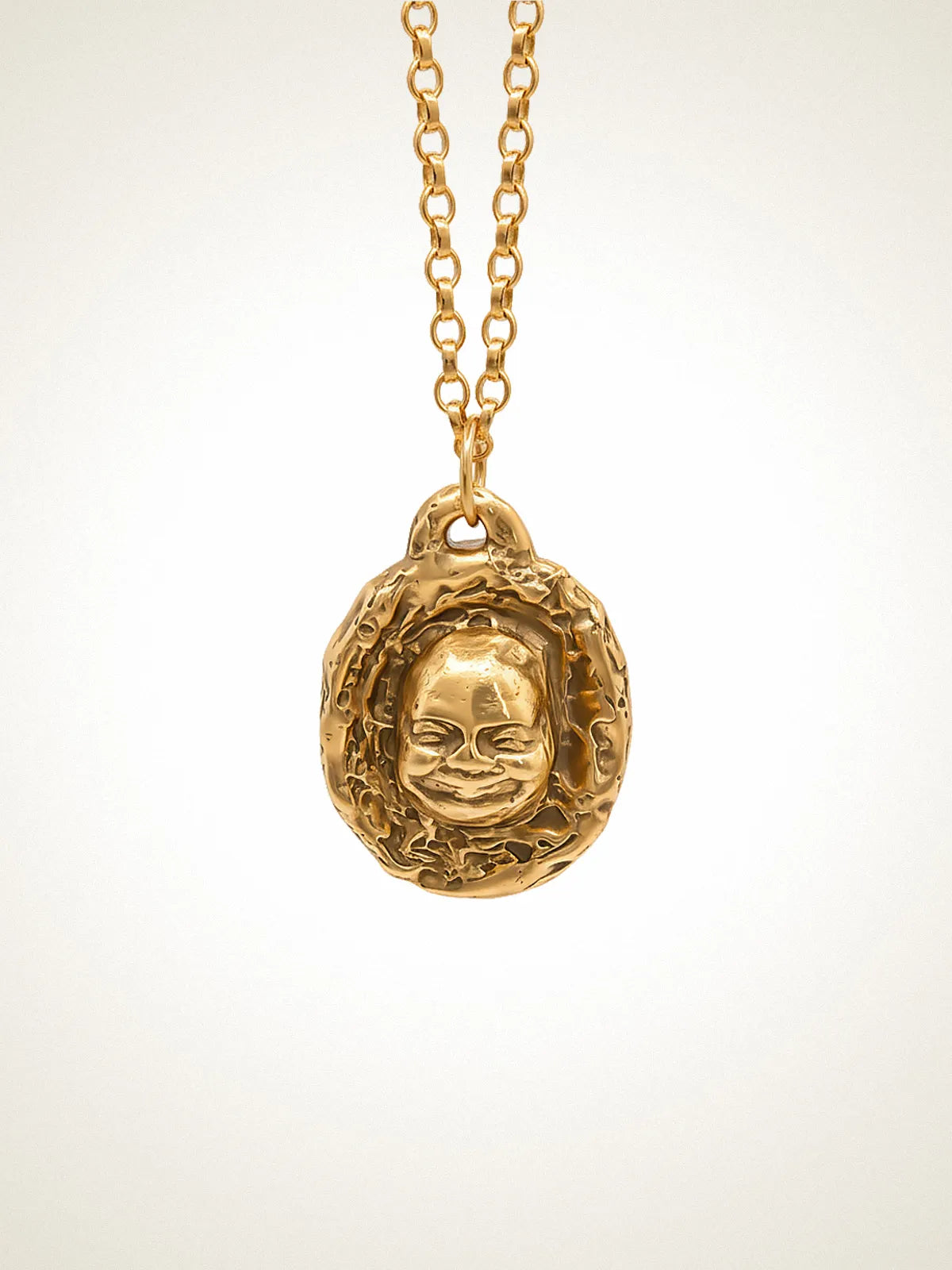 Buddha Face Necklace artisan crafted necklace in 18ct Gold Vermeil, zen design, lifestyle shot