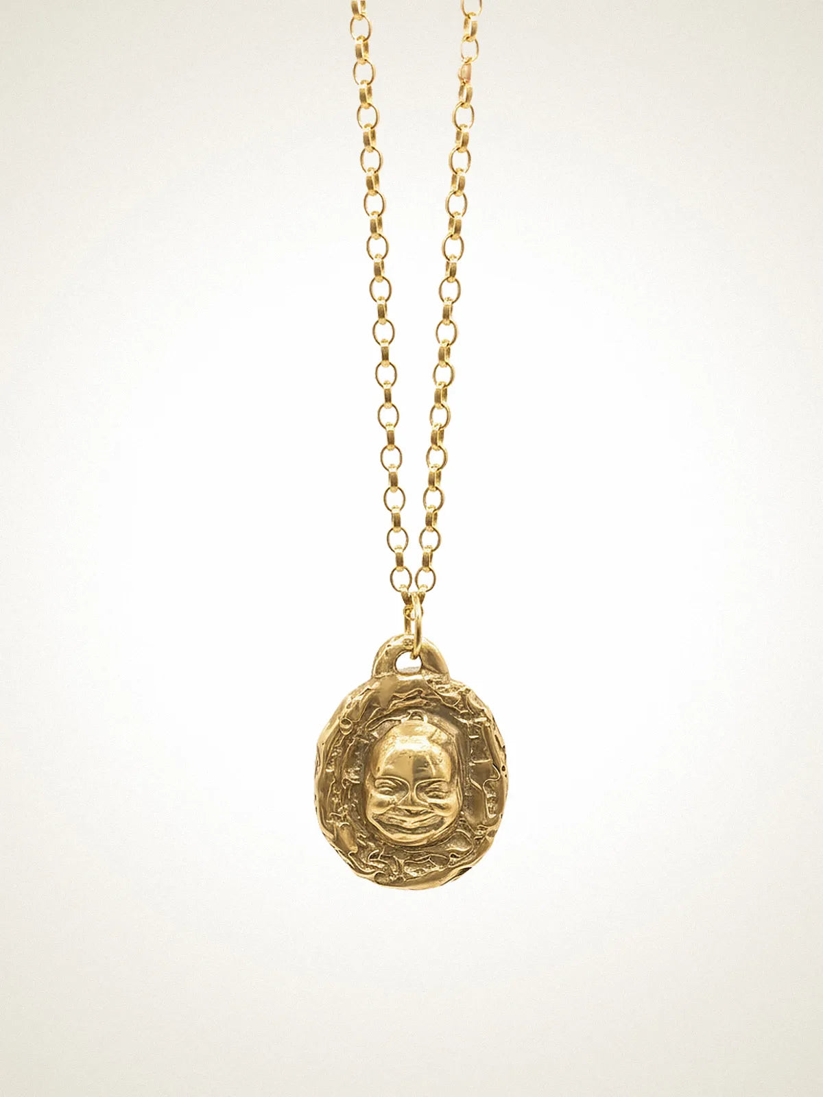 Artisan Buddha Face Necklace in premium Patina, meaningful design, angle view