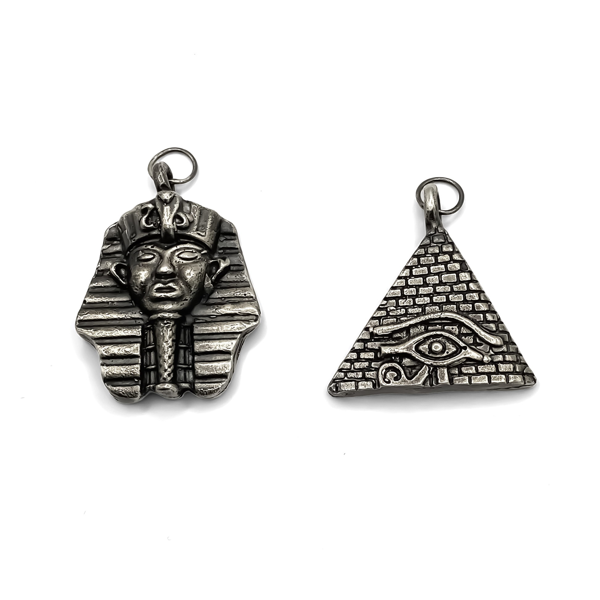 Group image of Horus Eye Pyramid and Pharaoh Pendants in oxidised gold or silver with free UK shipping
