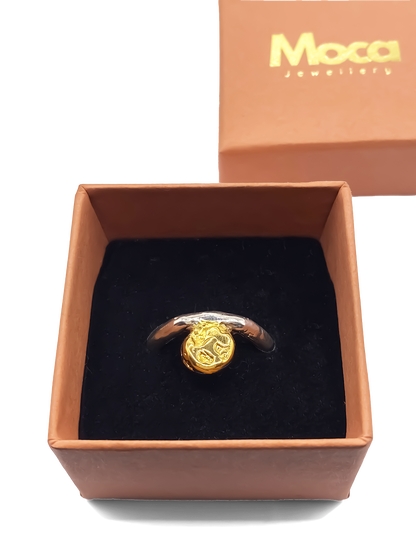 Minimal handmade ring by MOCA Jewellery featuring a gold textured circle accent