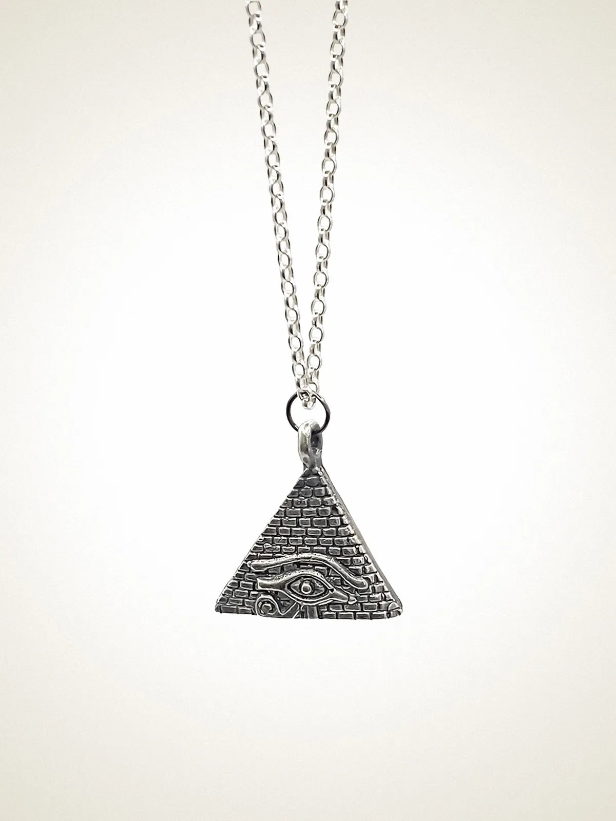 Handcrafted Horus Eye Pyramid Necklace in Patina, artisan jewelry, elegant design