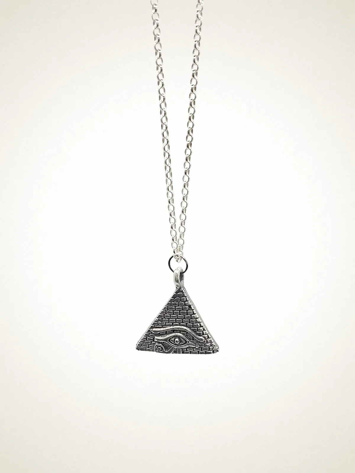 Horus Eye Pyramid Necklace artisan crafted necklace in premium metal, timeless style, lifestyle shot