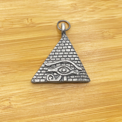 Oxidised gold or silver Horus Eye Pyramid Pendant with ancient Egyptian symbolism and free UK shipping