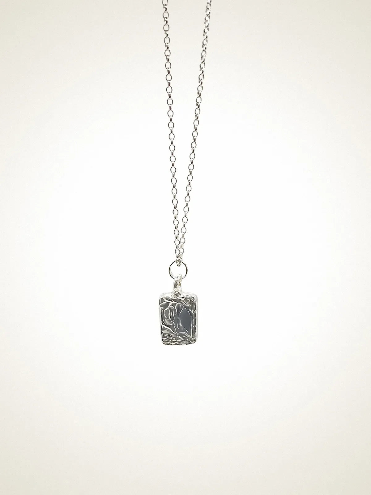 Premium Rectangular Sculpted Necklace handmade in Sterling silver, classic design, worn view