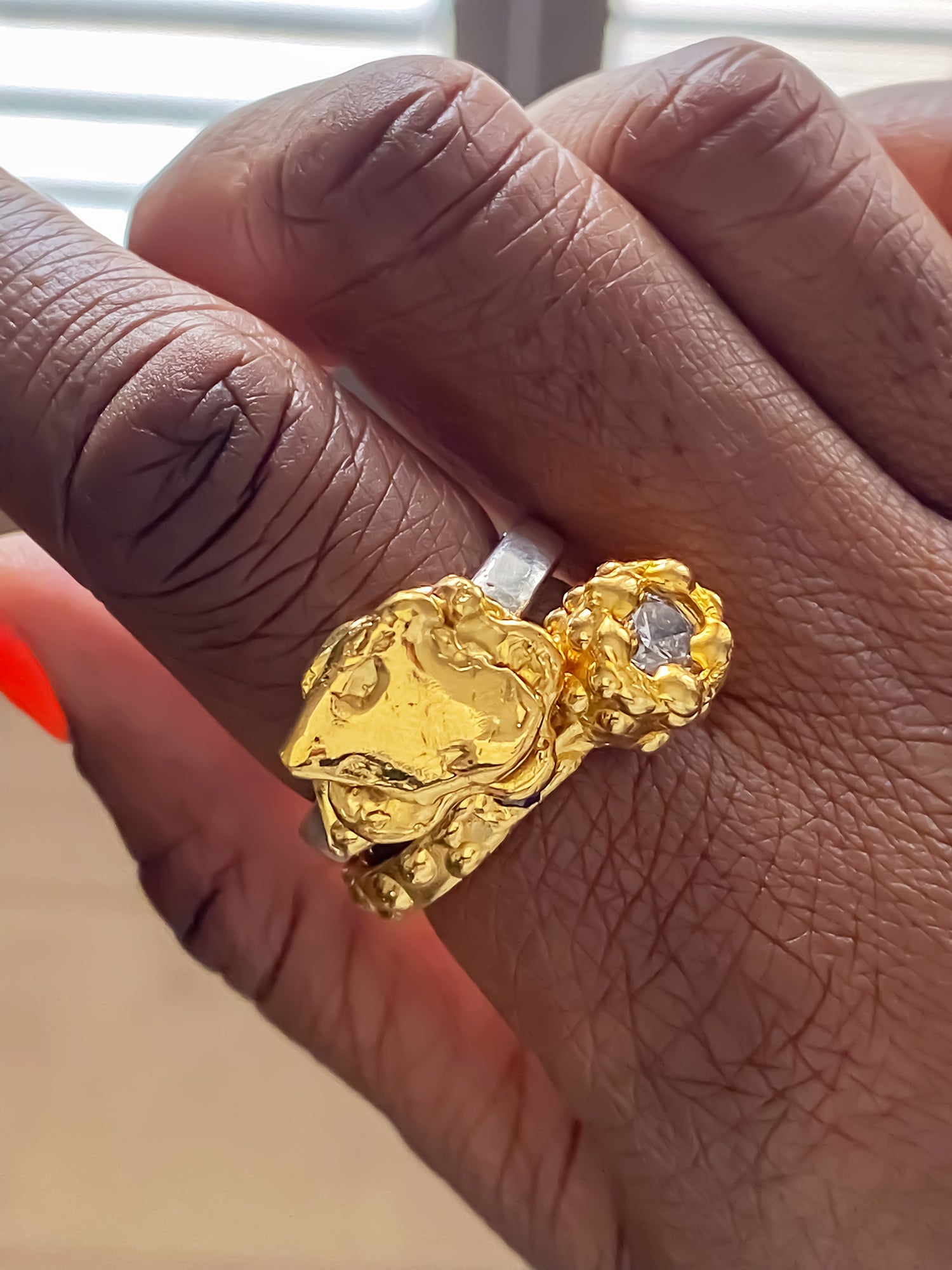 Gold ring set with sculptural embellishment and crystals, unique design from MOCA Jewellery.