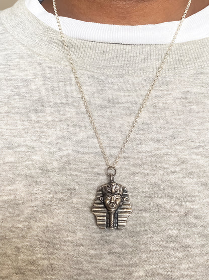 Pharaoh Pendant worn on chest close-up - oxidised Egyptian African gold or silver free shipping