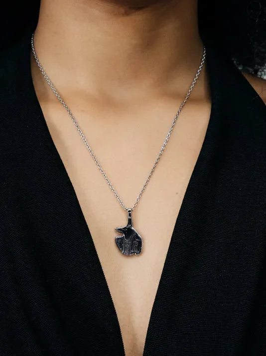 Artisan Anubis - the jackal-headed god in premium premium metal, refined finish, angle view