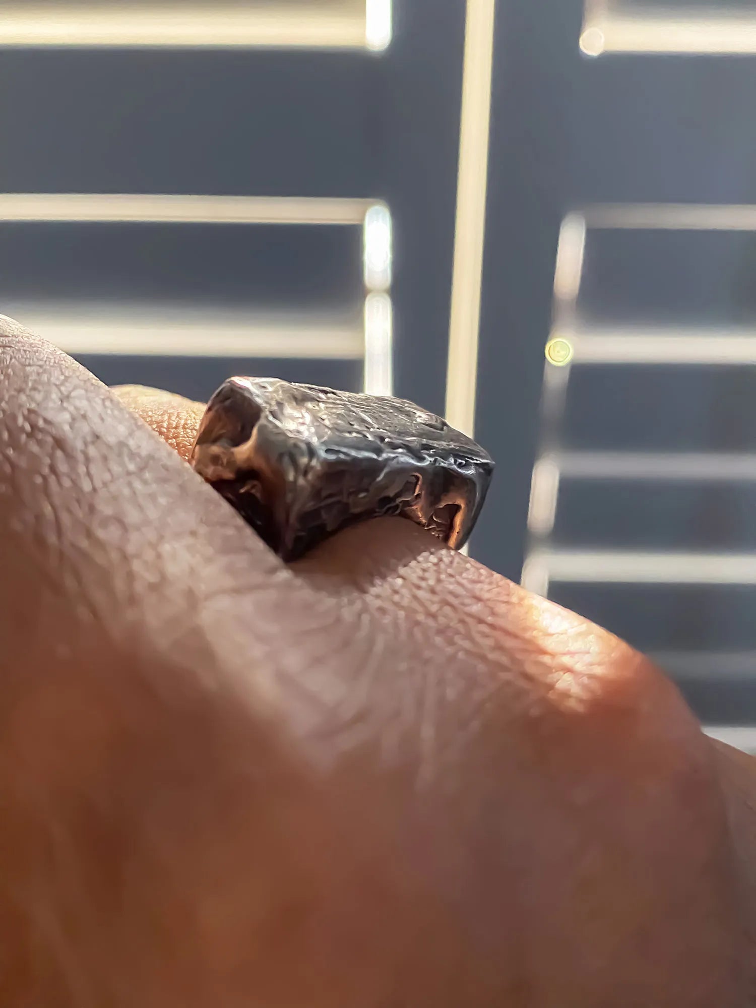 Rippled Signet Ring luxury artisan ring in Patina, elegant finish, styled view