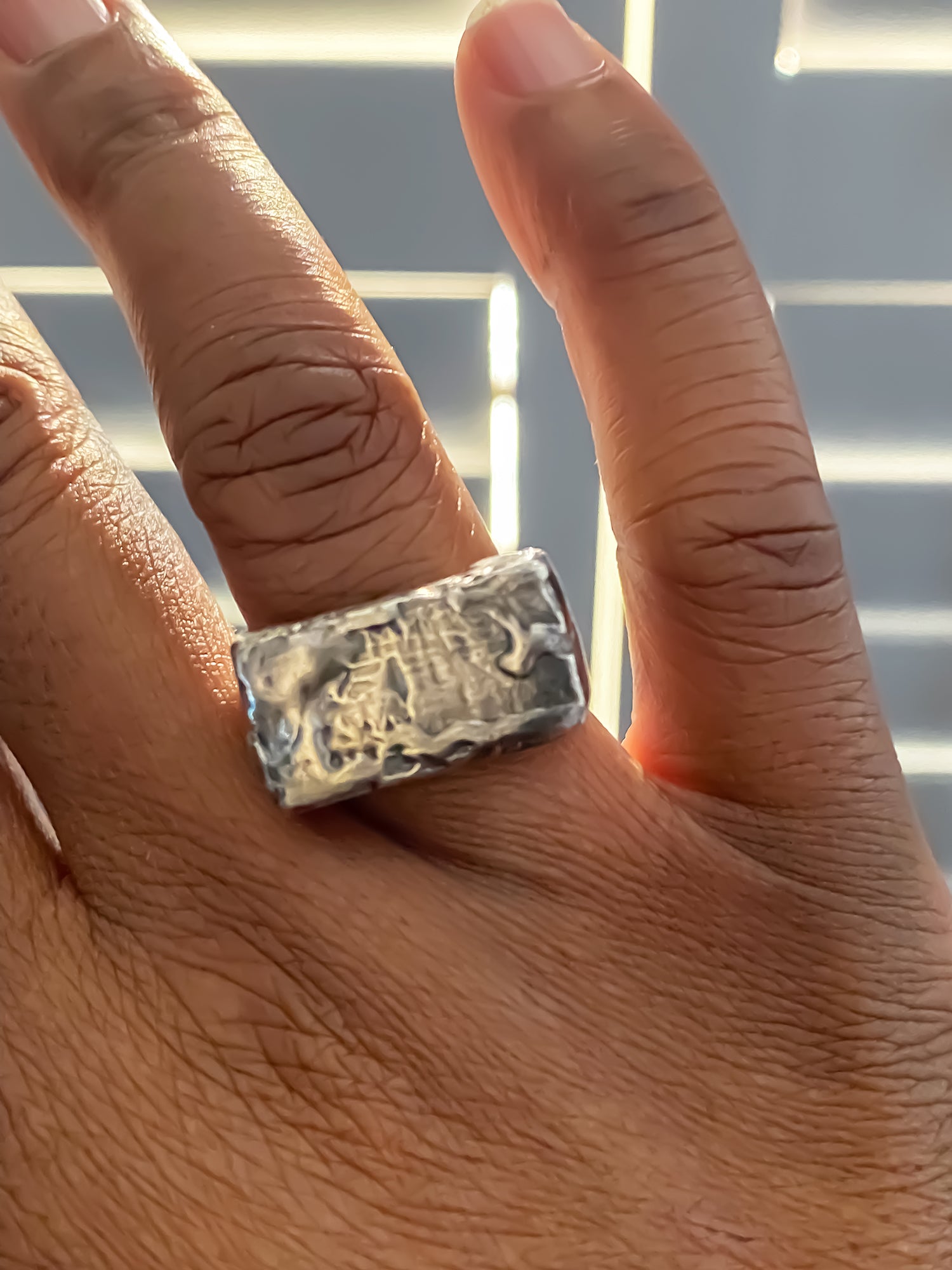 Rippled Signet Ring in oxidised textured gold or silver with free shipping, worn on a hand