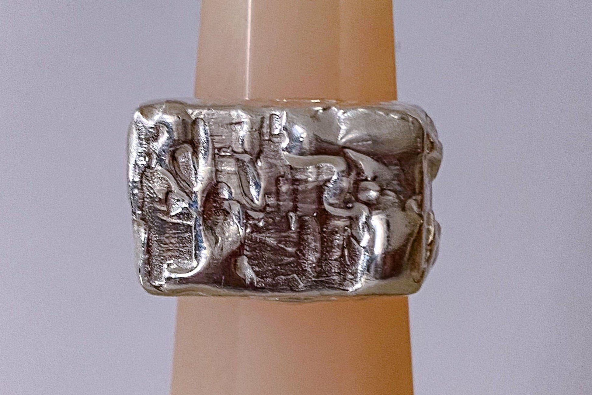 Moca Jewellery Rosa Signet Ring bubble texture playful gold or silver free shipping displayed on a ring holder