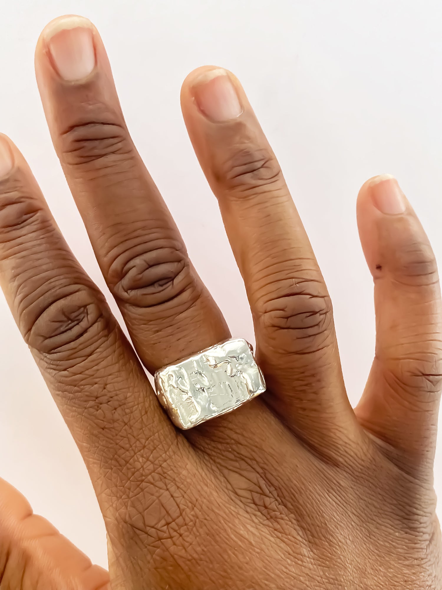 Moca Jewellery Rosa Signet Ring bubble texture playful gold or silver free shipping showcased on a hand