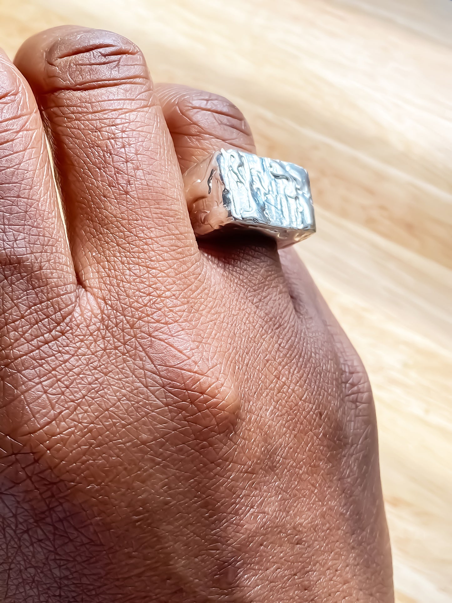 Moca Jewellery Rosa Signet Ring bubble texture playful gold or silver with free shipping displayed on a hand