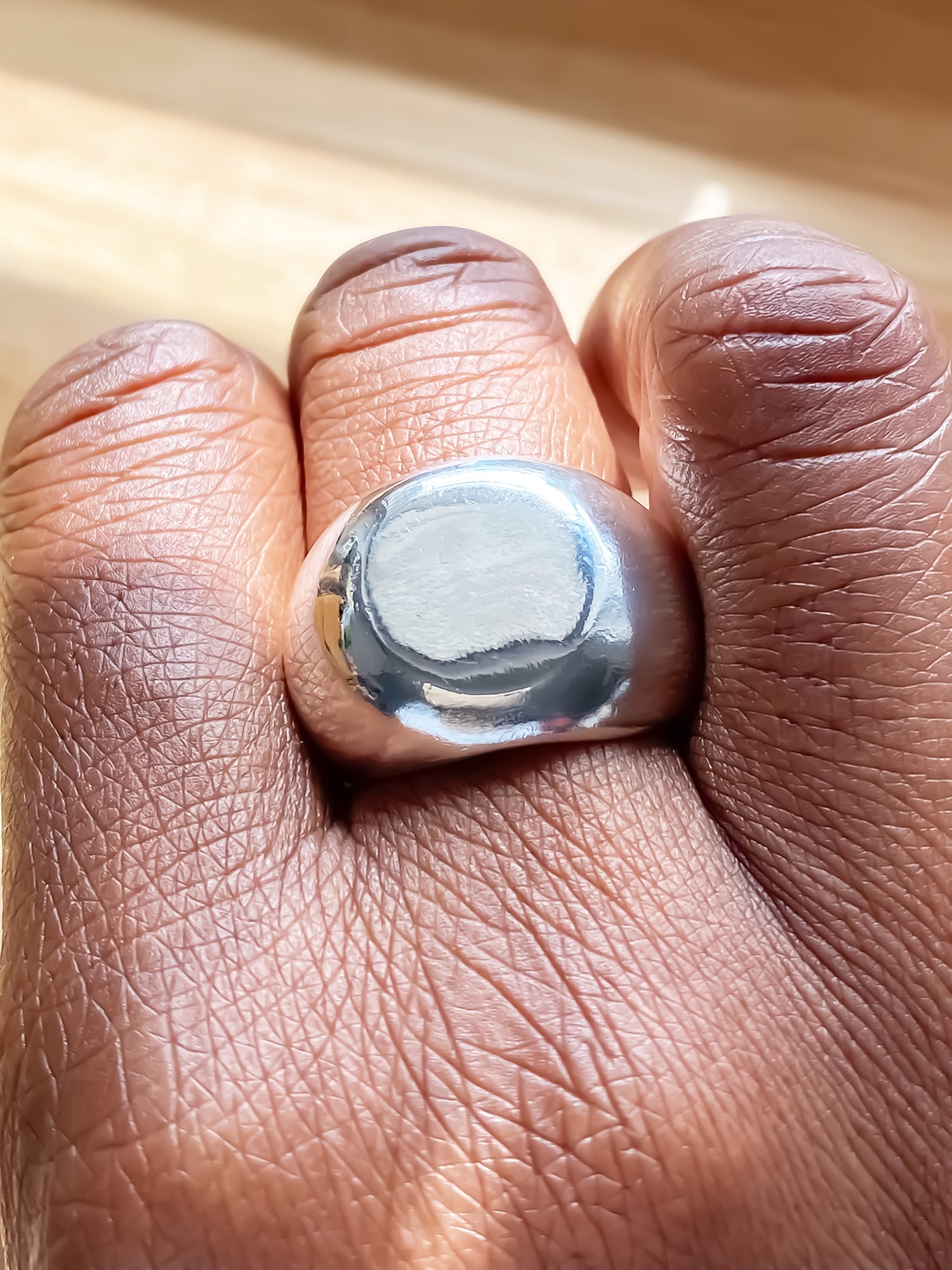 Moca Jewellery Round Signet Ring gold or silver free shipping sleek classic design modeled on a hand