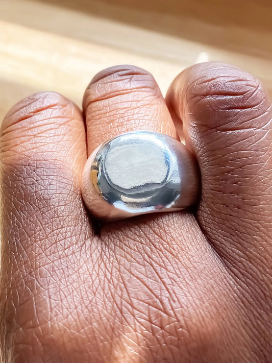 Round Signet Ring handmade luxury ring, Sterling silver finish, smooth polished surface, close-up
