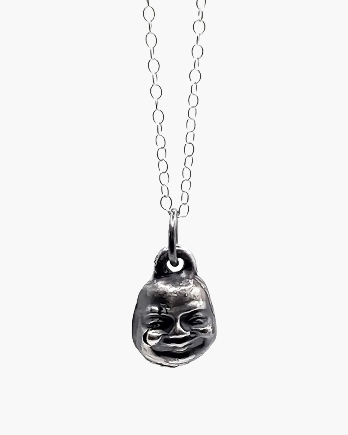 Premium Small Buddha Face Necklace handmade in Sterling silver, peaceful pendant, worn view