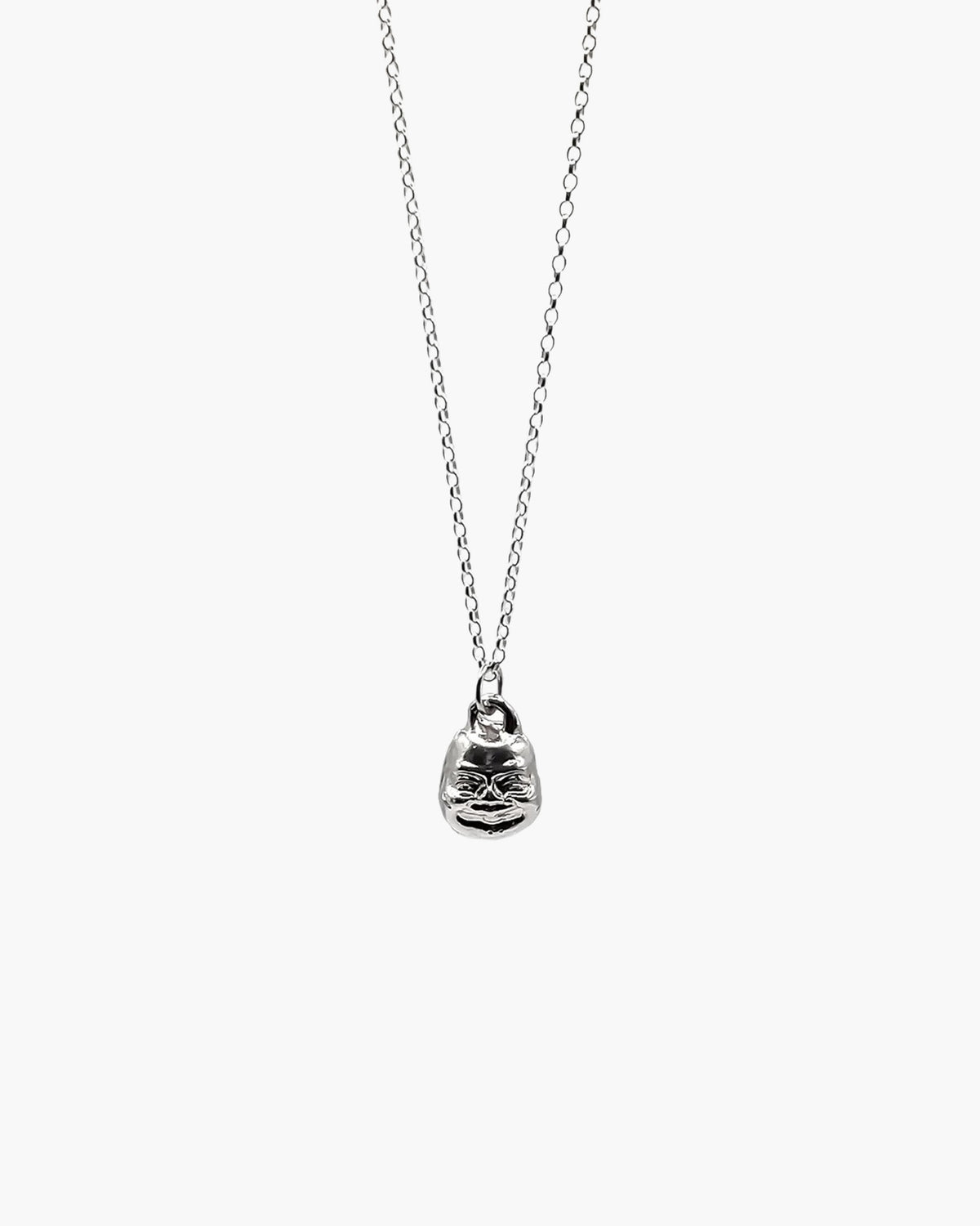 Handcrafted Small Buddha Face Necklace premium Patina jewelry, tranquil design, product shot