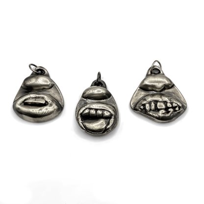 Group display with Smiler Pendant and facial designs - smile mouth lips teeth charming oxidised organic texture gold or silver free shipping