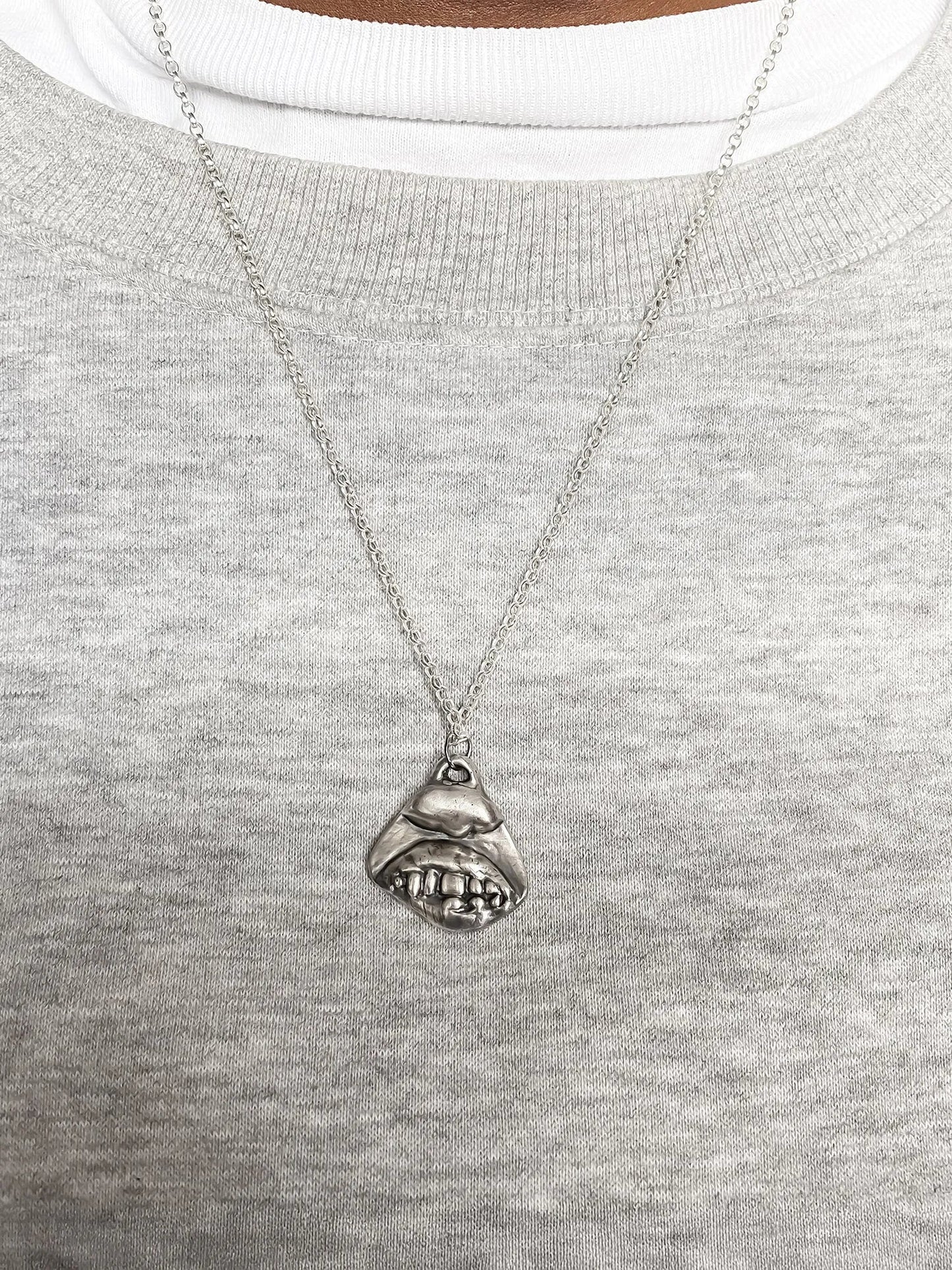 Premium Smiler Necklace handmade in premium metal, happy face, worn view