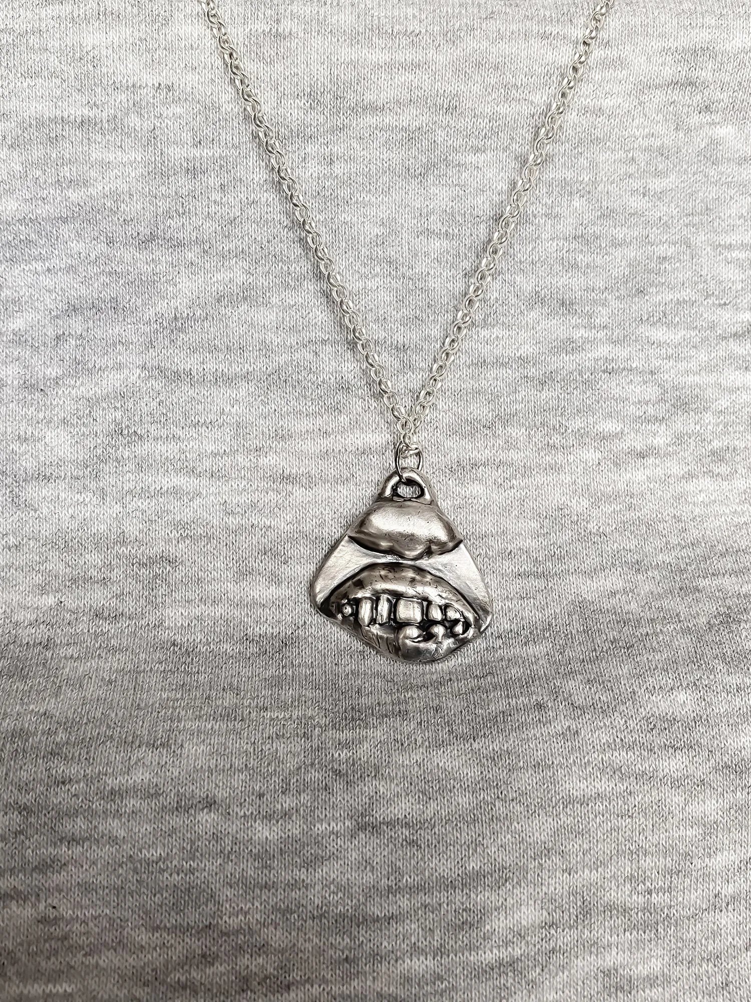 Smiler Necklace designer necklace in premium metal, positive vibes, side view