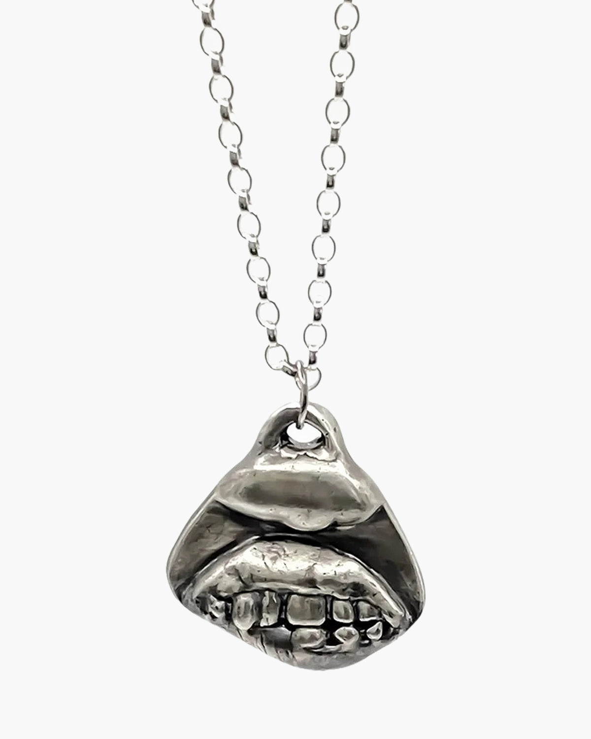 Smiler Necklace artisan crafted necklace in premium metal, uplifting design, lifestyle shot