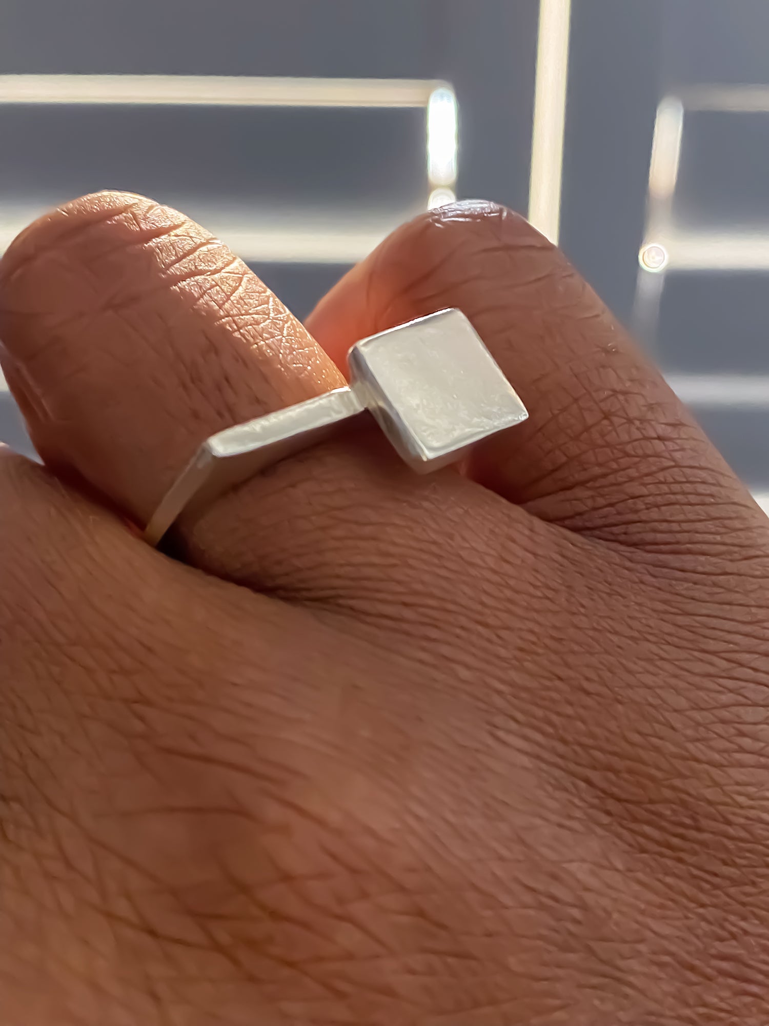Square Top Signet Ring on hand in mid-motion - sleek design minimal gold or silver free shipping
