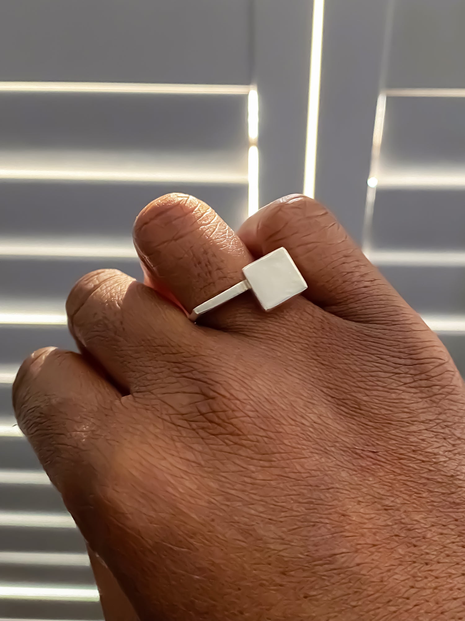 Square Top Signet Ring in gold worn by hand model - sleek design minimal gold or silver free shipping