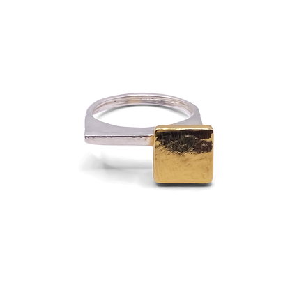 Silver ring with gold square top on white background, MOCA Jewellery piece