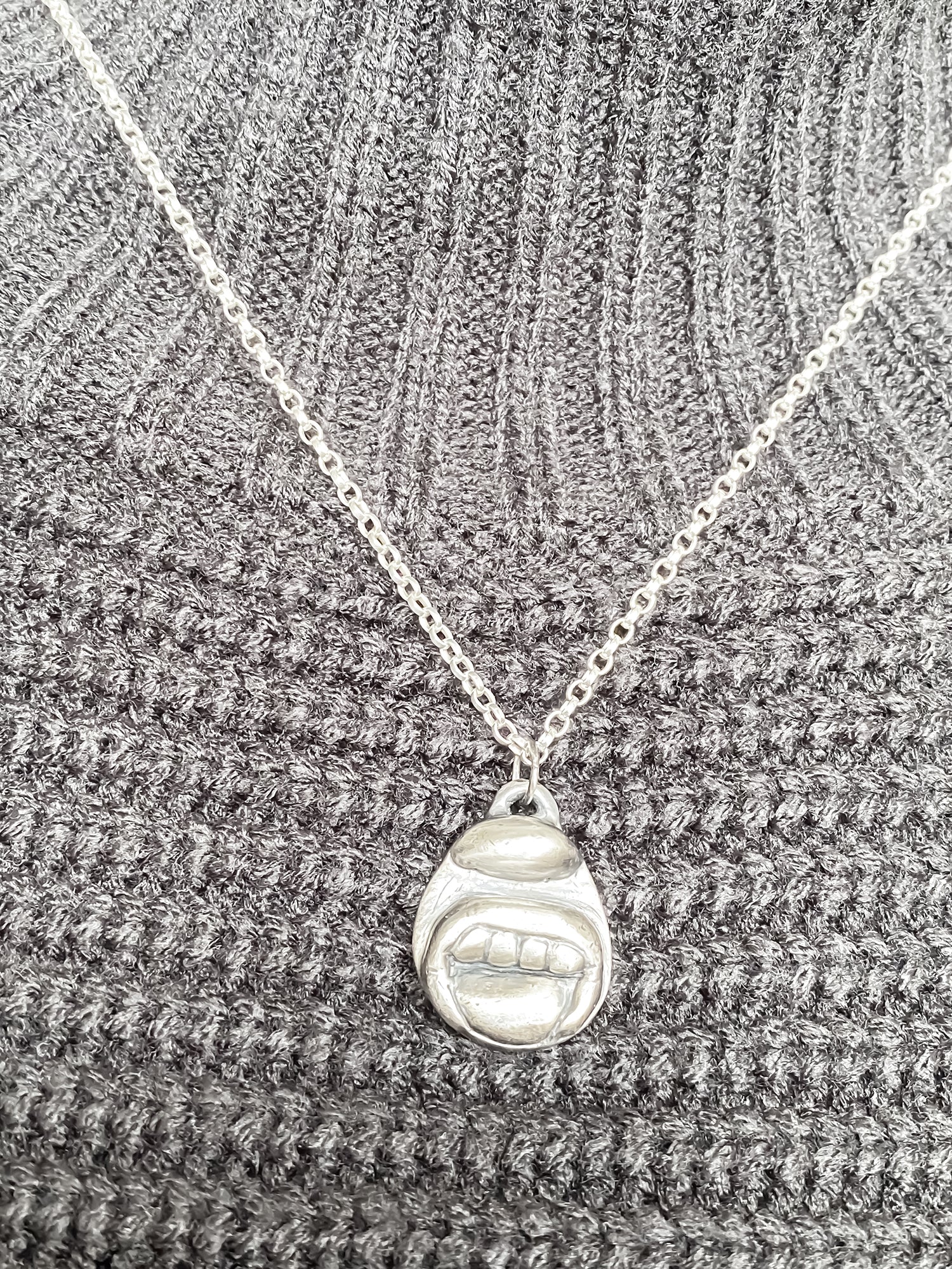 Tongue & Teeth Pendant worn with layered necklaces - tongue smile mouth lips charming oxidised organic texture gold or silver free shipping