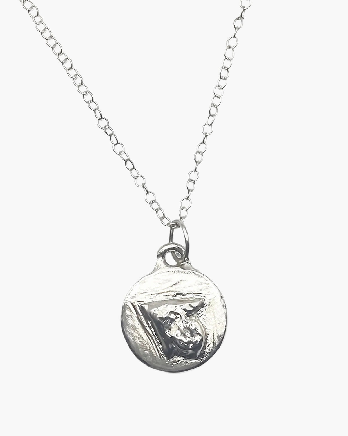 Sterling silver Trainage and Circle pendant with a gold triangle