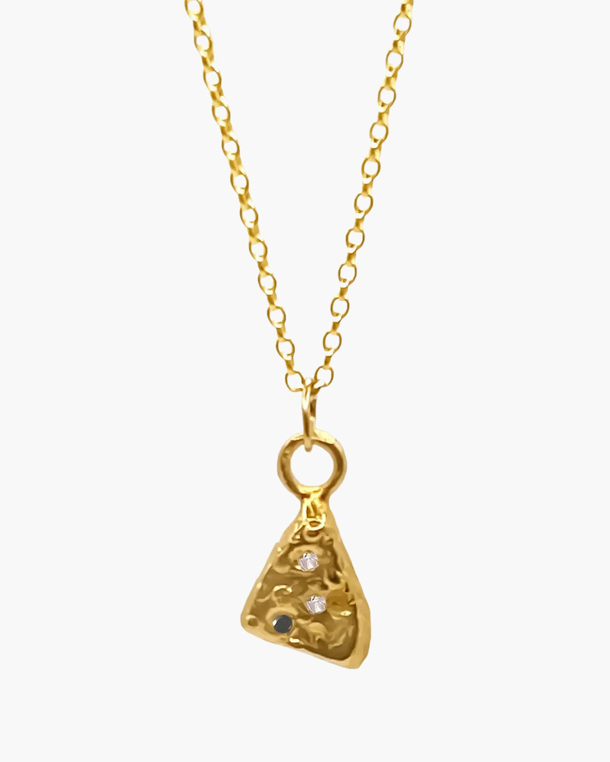 Close-up of the gold vermeil Triad Spark Gem pendant