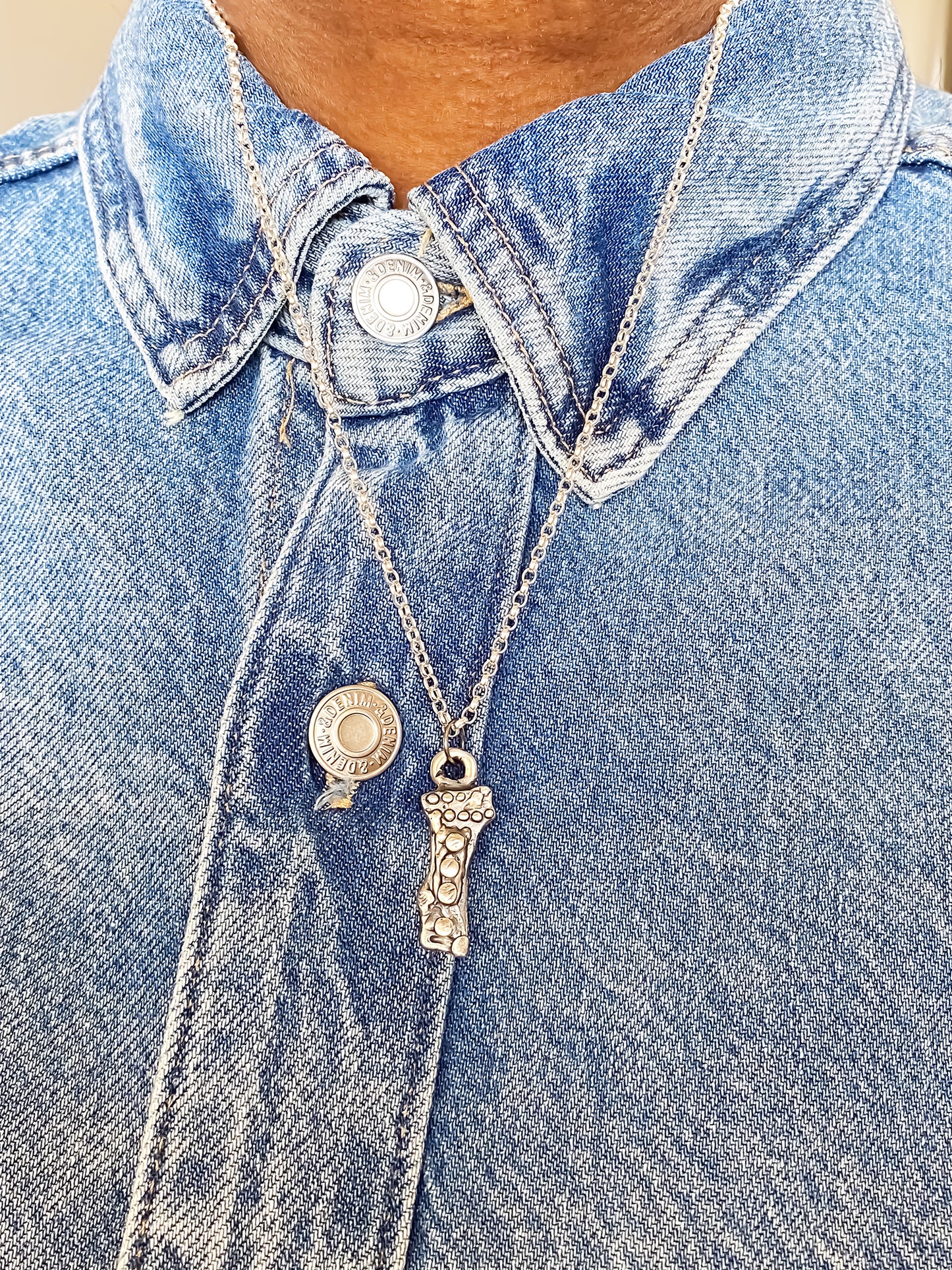 Twig Pendant worn with layered chains on denim - charming oxidised organic texture gold or silver free shipping