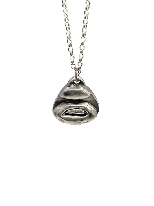 Two Teeth Pendant in frontal drop view - smile mouth lips charming oxidised organic texture gold or silver free shipping