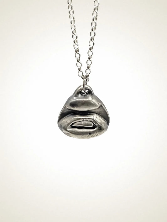 Handcrafted Two Teeth Necklace in Patina, artisan jewelry, elegant design