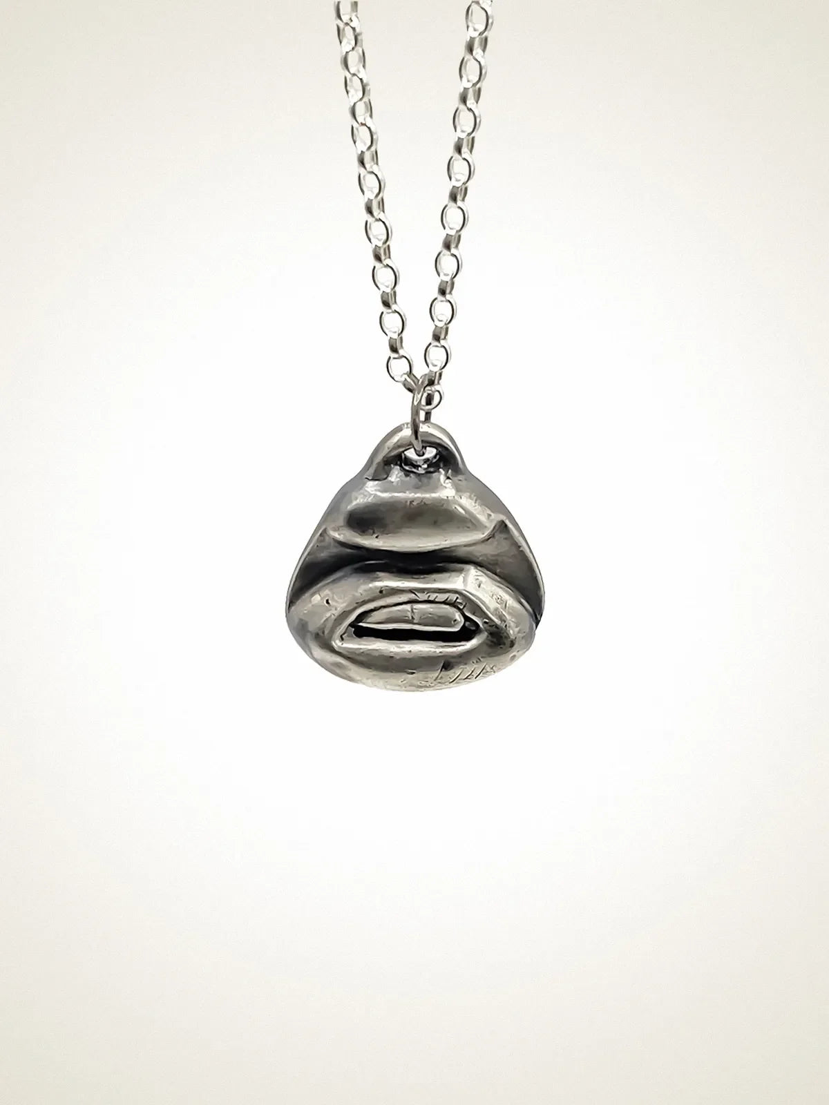 Handcrafted Two Teeth Necklace in Patina, artisan jewelry, elegant design