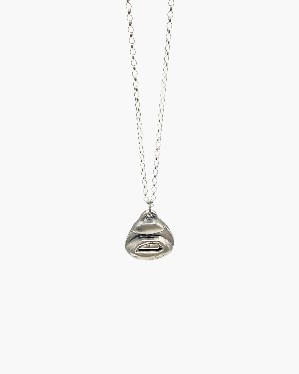 Two Teeth Necklace artisan crafted necklace in premium metal, timeless style, lifestyle shot