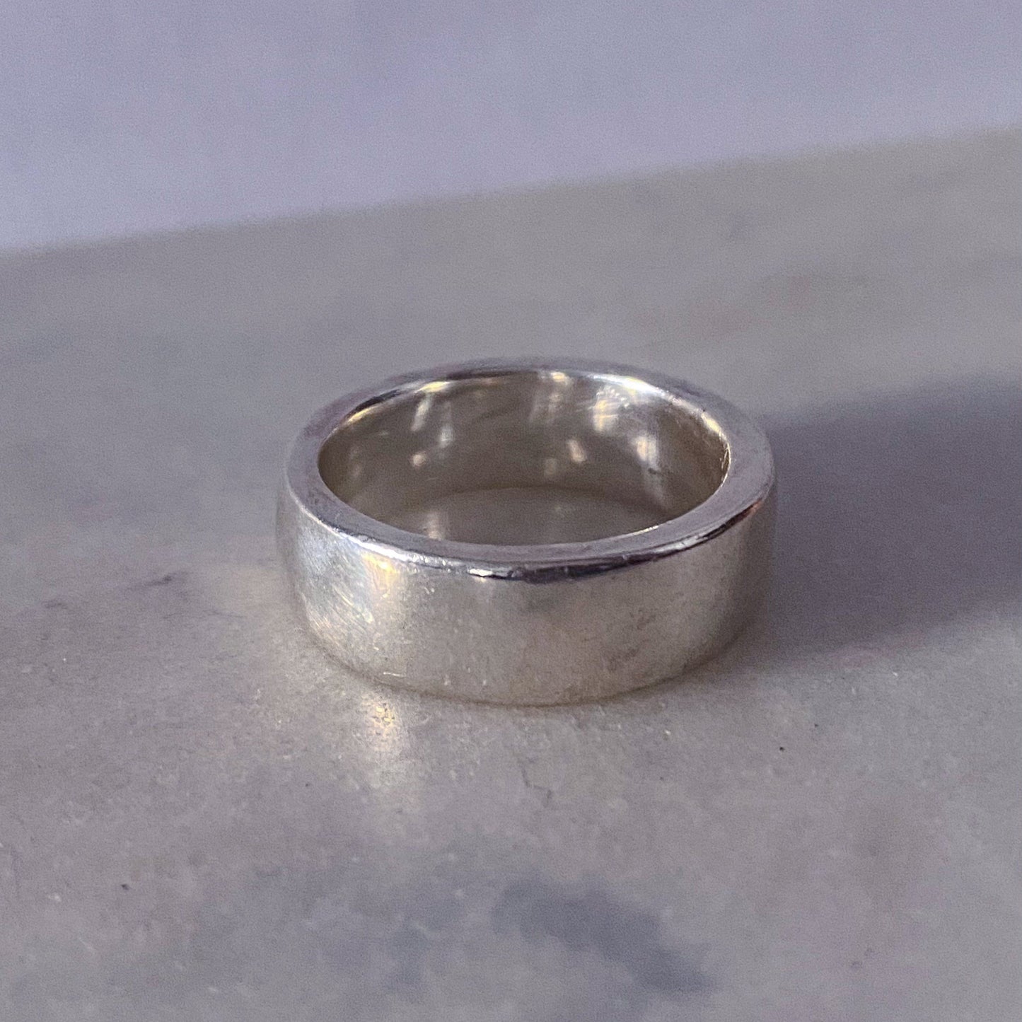 Wide Band Ring with polished finish shown from side - unisex, subtle wedding band bold gold or silver free shipping