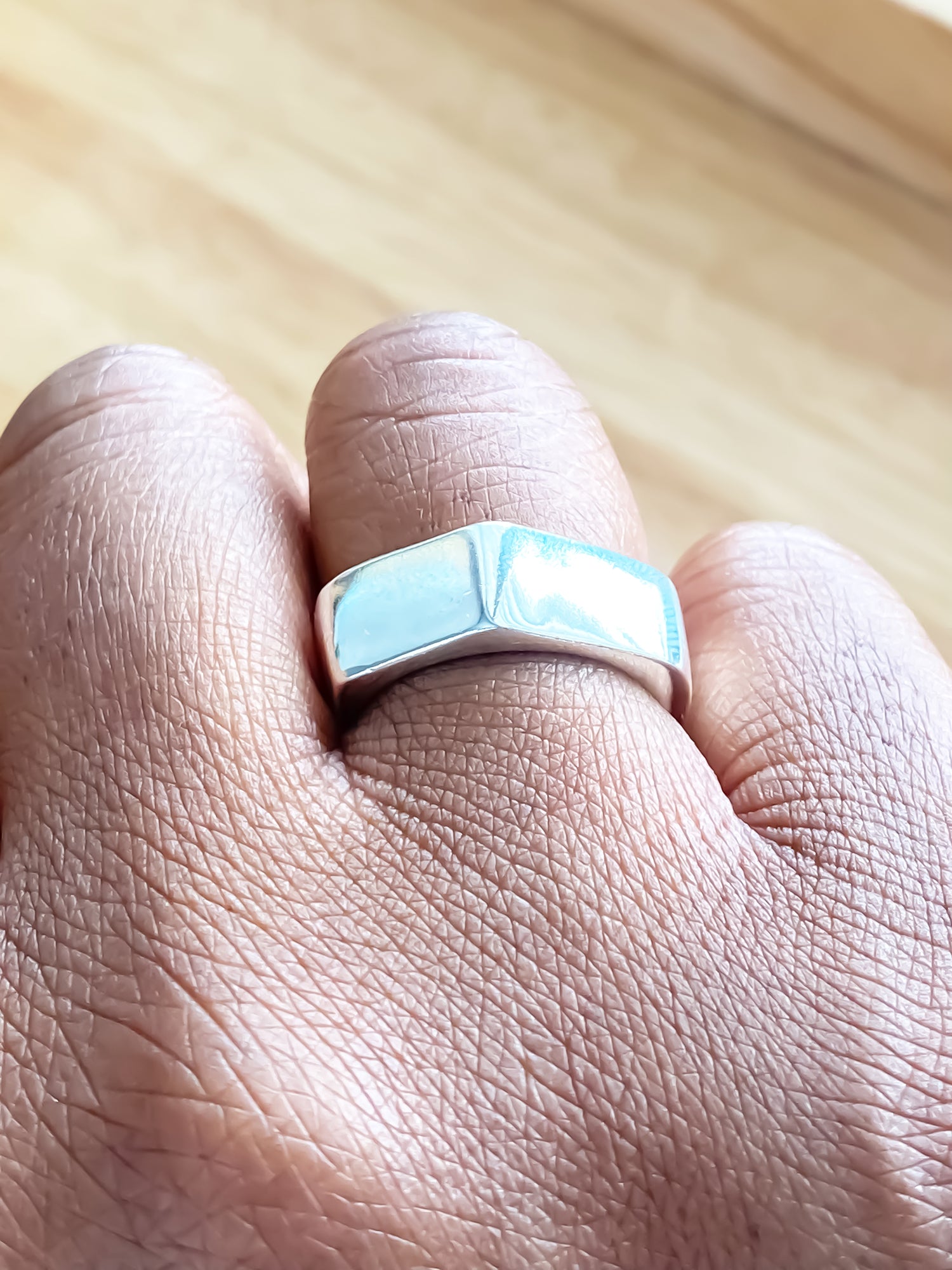 Model wearing Wonky Nut Ring, hand in profile - playfully unique elegant gold or silver free shipping