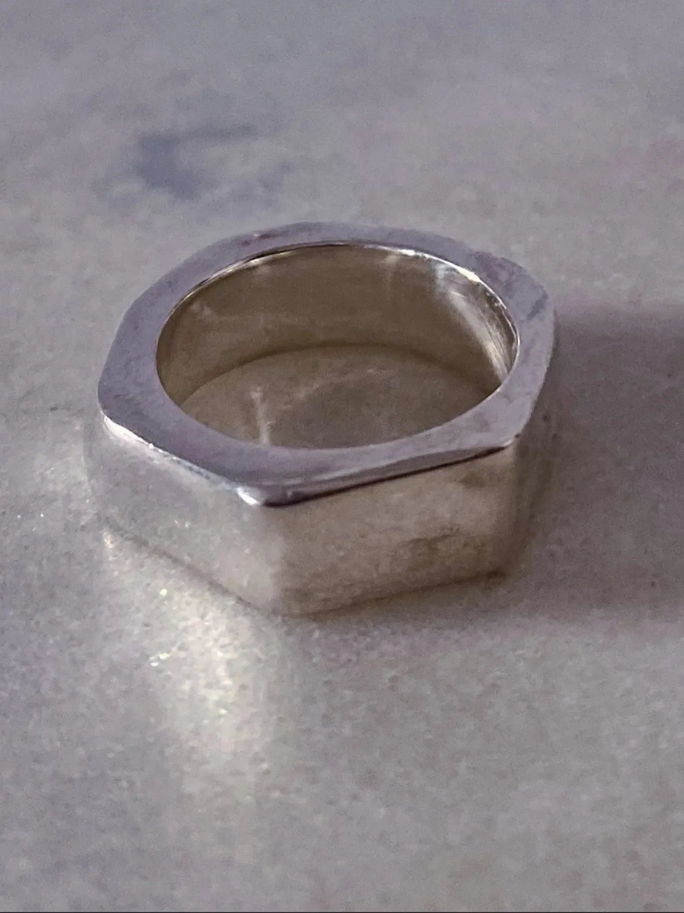 Premium Wonky Nut Ring handmade in Gold Black & Green Gemstone, classic design, worn view